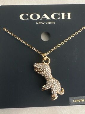 Coach Gold-tone T-Rex Pendant Necklace